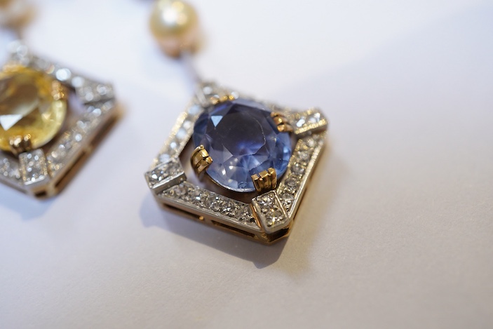 An Art Deco sapphire, natural pearl and diamond necklace, circa 1920
